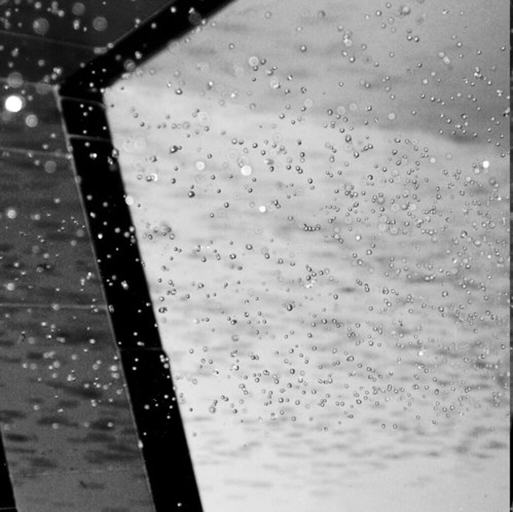 water drops on an abstract, geometric background